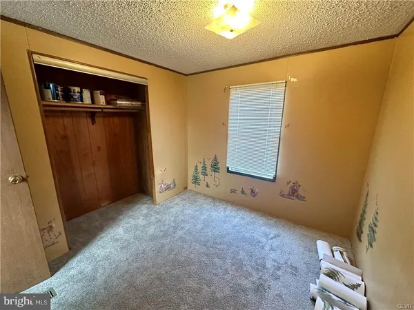 an empty room with closet