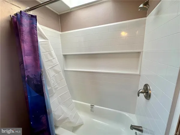 a bathroom with a bathtub