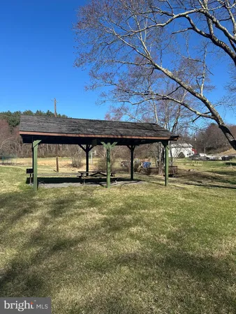 a view of yard with outdoor seating