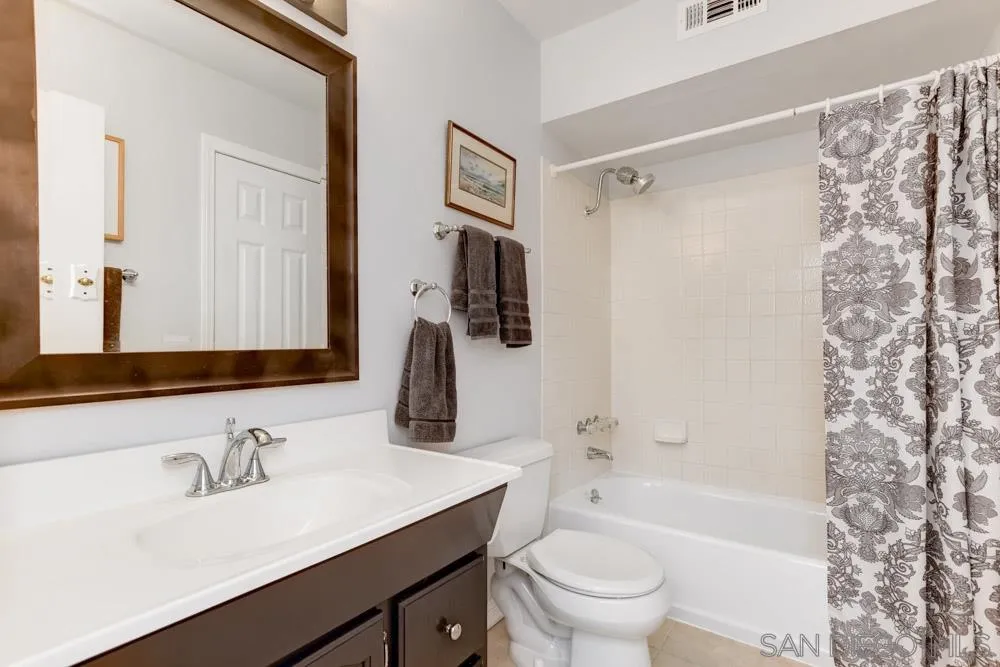 433 Village Run East Encinitas, CA 92024 - Photo 12 of 25 a bathroom with a sink a toilet and a bathtub