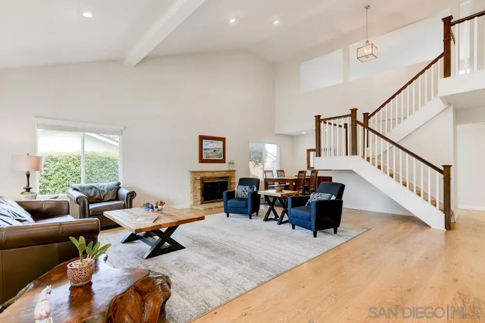 433 Village Run East Encinitas, CA 92024 - Photo 3 of 25 a living room with furniture and a fireplace
