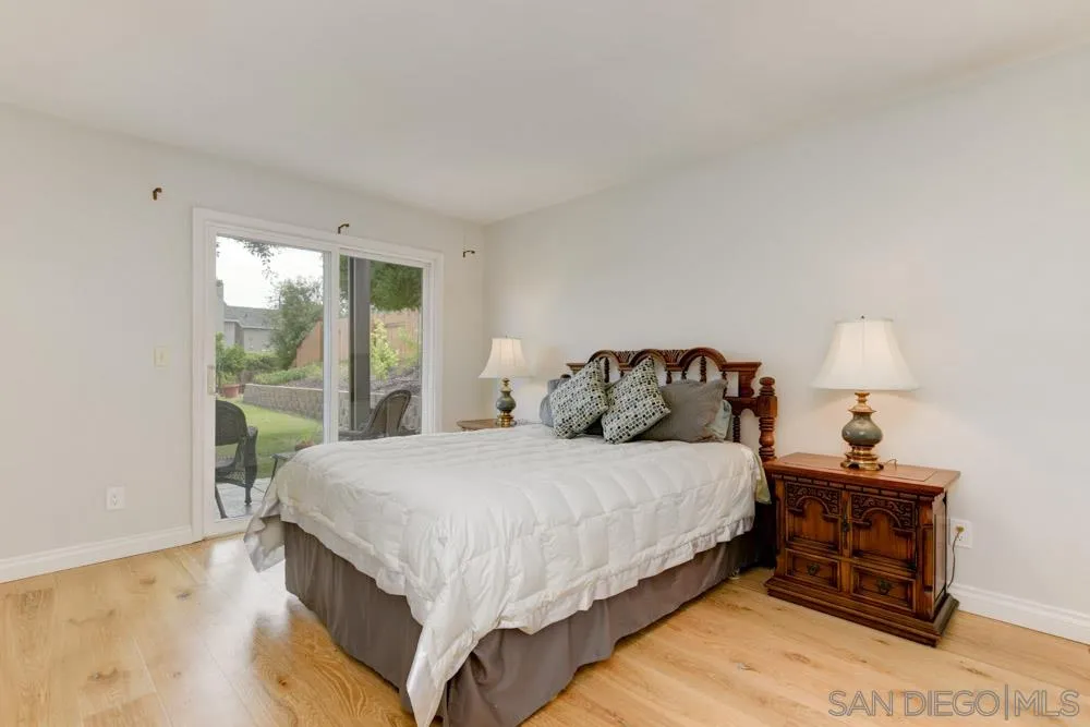 433 Village Run East Encinitas, CA 92024 - Photo 10 of 25 a bedroom with a bed and window