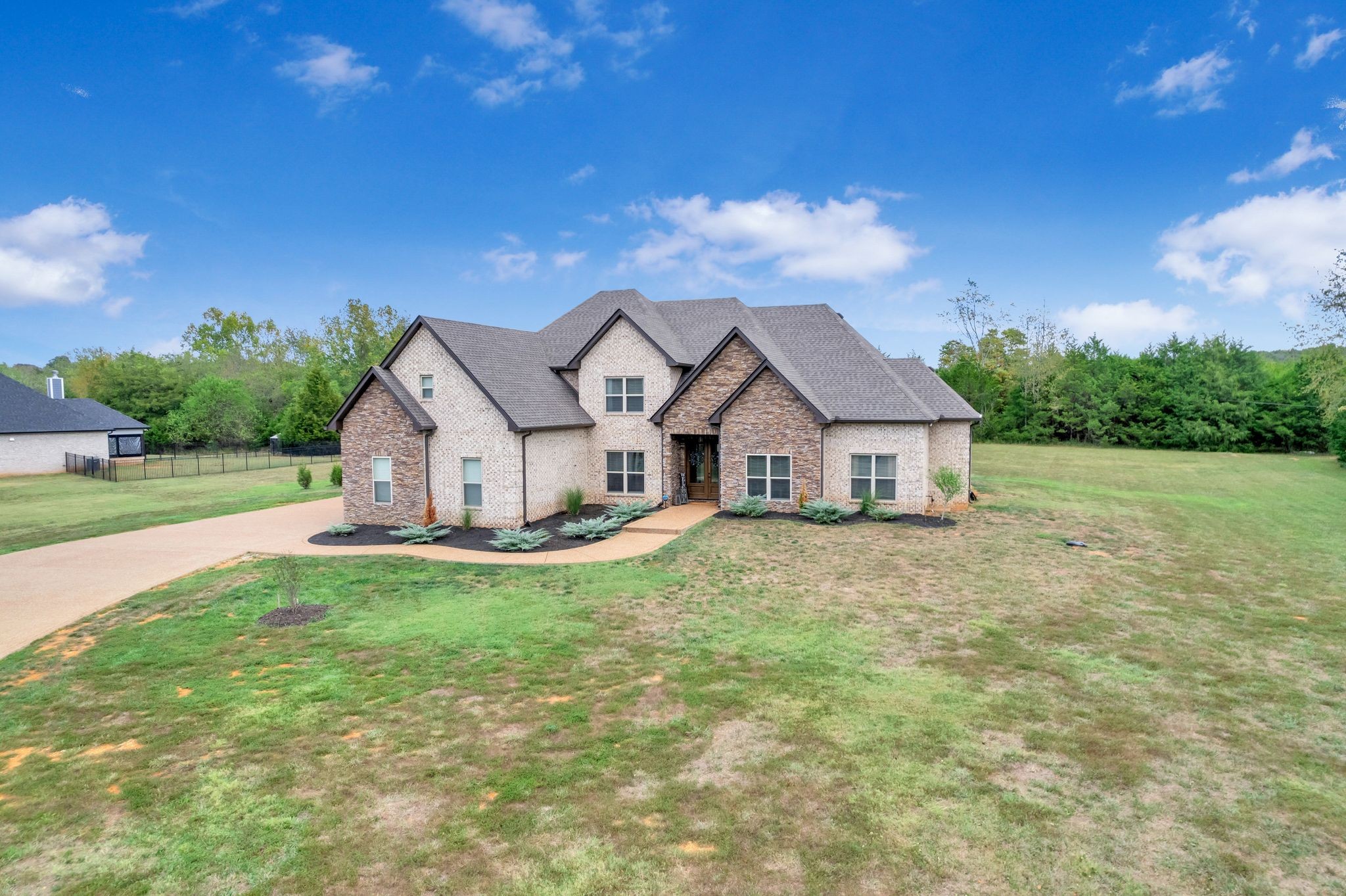 10494 Powells Chapel Road Murfreesboro, TN 37129 - Photo 54 of 58 a front view of a house with yard and green space
