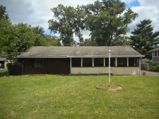 a house view with a garden space