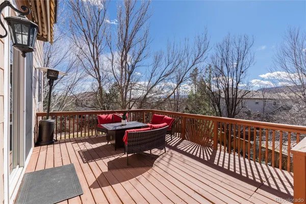 a view of balcony with wooden floor and outdoor space