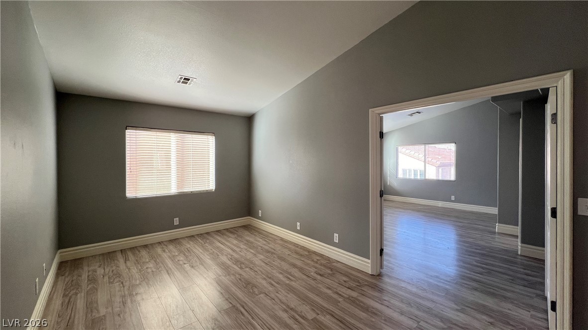 258 Rustic Club Way Las Vegas, NV 89148 - Photo 10 of 25 This versatile room features durable flooring and abundant natural light.