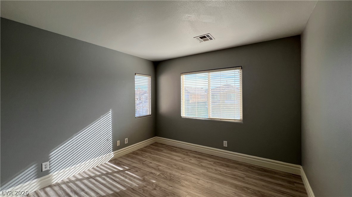 258 Rustic Club Way Las Vegas, NV 89148 - Photo 18 of 25 This bright room features durable flooring and ample natural light, creating a welcoming atmosphere.