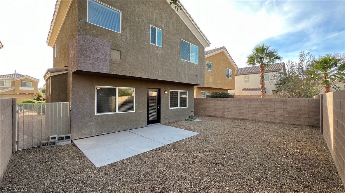 258 Rustic Club Way Las Vegas, NV 89148 - Photo 24 of 25 This outdoor space features a concrete patio, perfect for enjoying the desert climate.