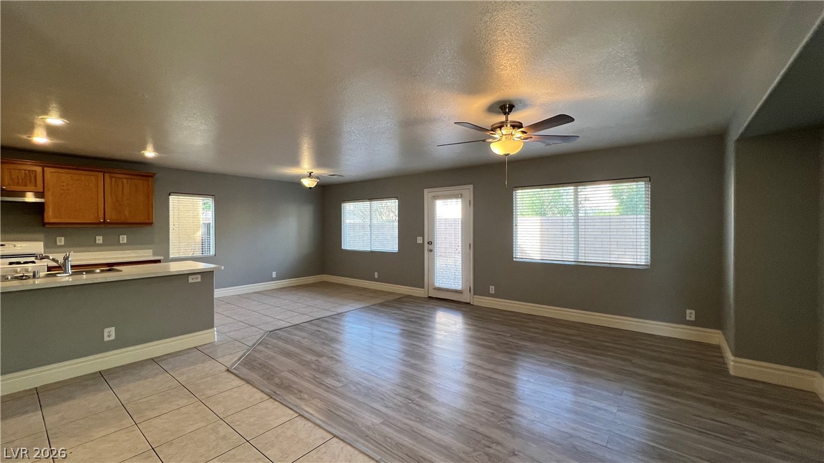 258 Rustic Club Way Las Vegas, NV 89148 - Photo 5 of 25 This inviting space features a seamless transition between the kitchen and living areas, perfect for daily living.