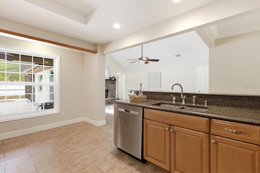 393 Wekiva Cove Road Longwood, FL 32779 - Photo 12 of 49 a bathroom with a sink and a window