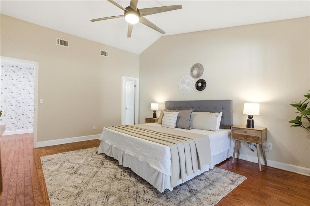 393 Wekiva Cove Road Longwood, FL 32779 - Photo 17 of 49 a bedroom with a bed and a dresser