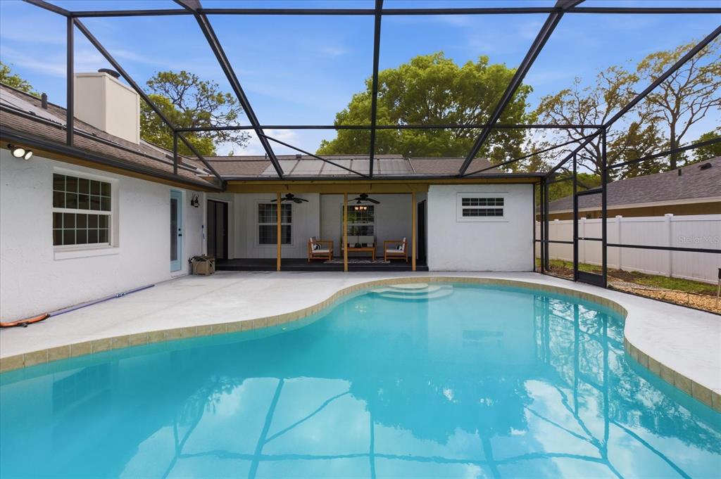 393 Wekiva Cove Road Longwood, FL 32779 - Photo 35 of 49 a view of a backyard with a swimming pool