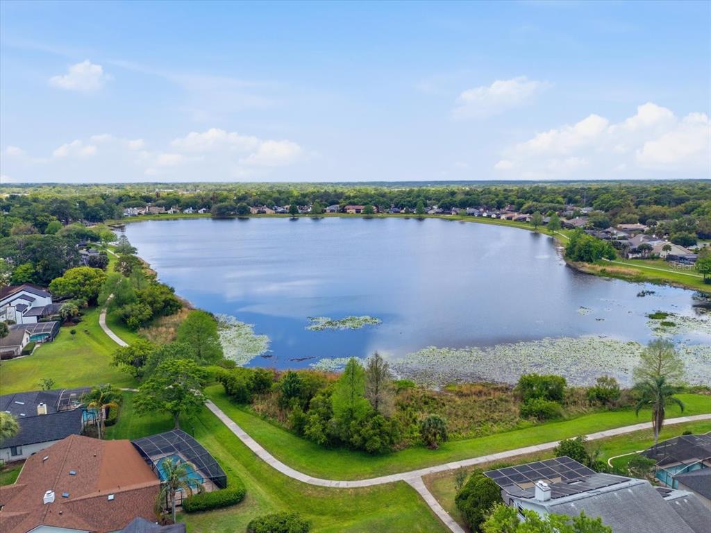 393 Wekiva Cove Road Longwood, FL 32779 - Photo 47 of 49 an aerial view of lake and houses with outdoor space