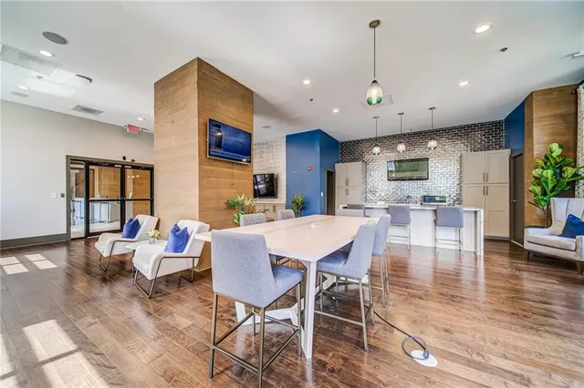 a view of a dining room with furniture