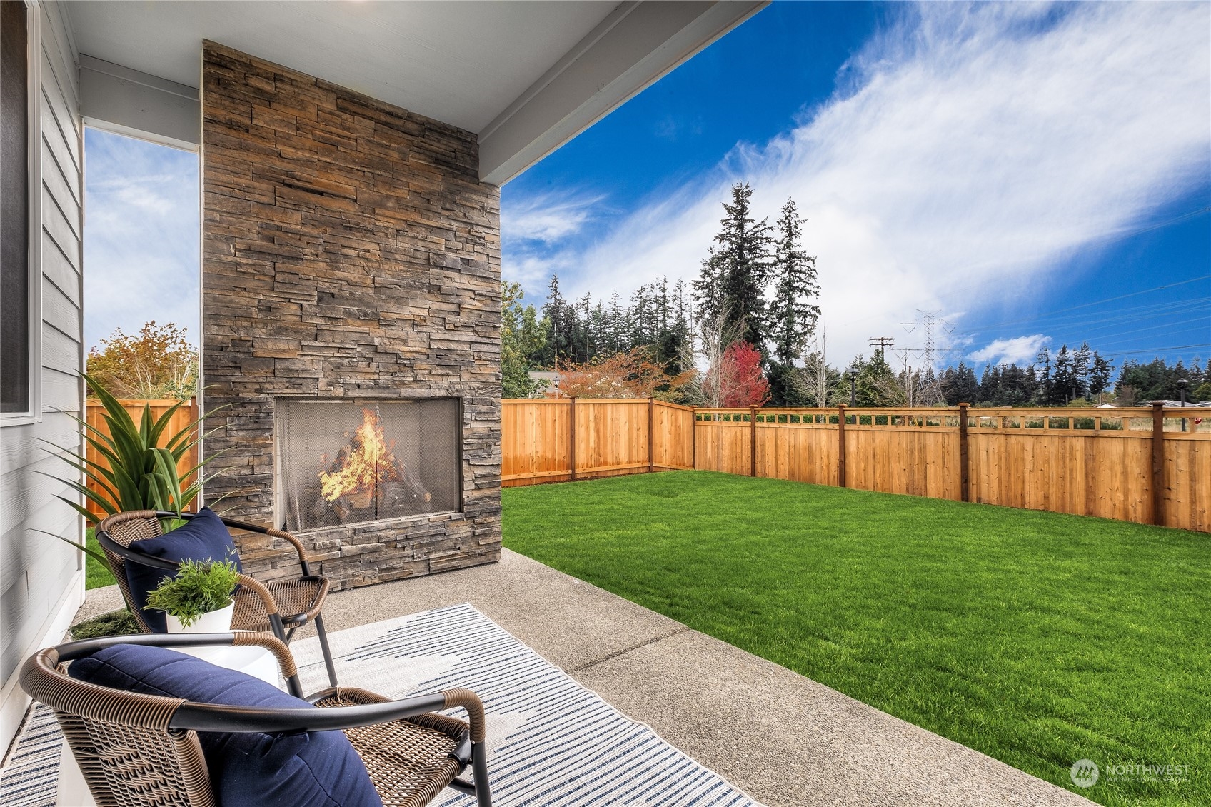 3932 233rd Street Southeast, Unit 83 Bothell, WA 98021 - Photo 16 of 18 a backyard of a house with seating space