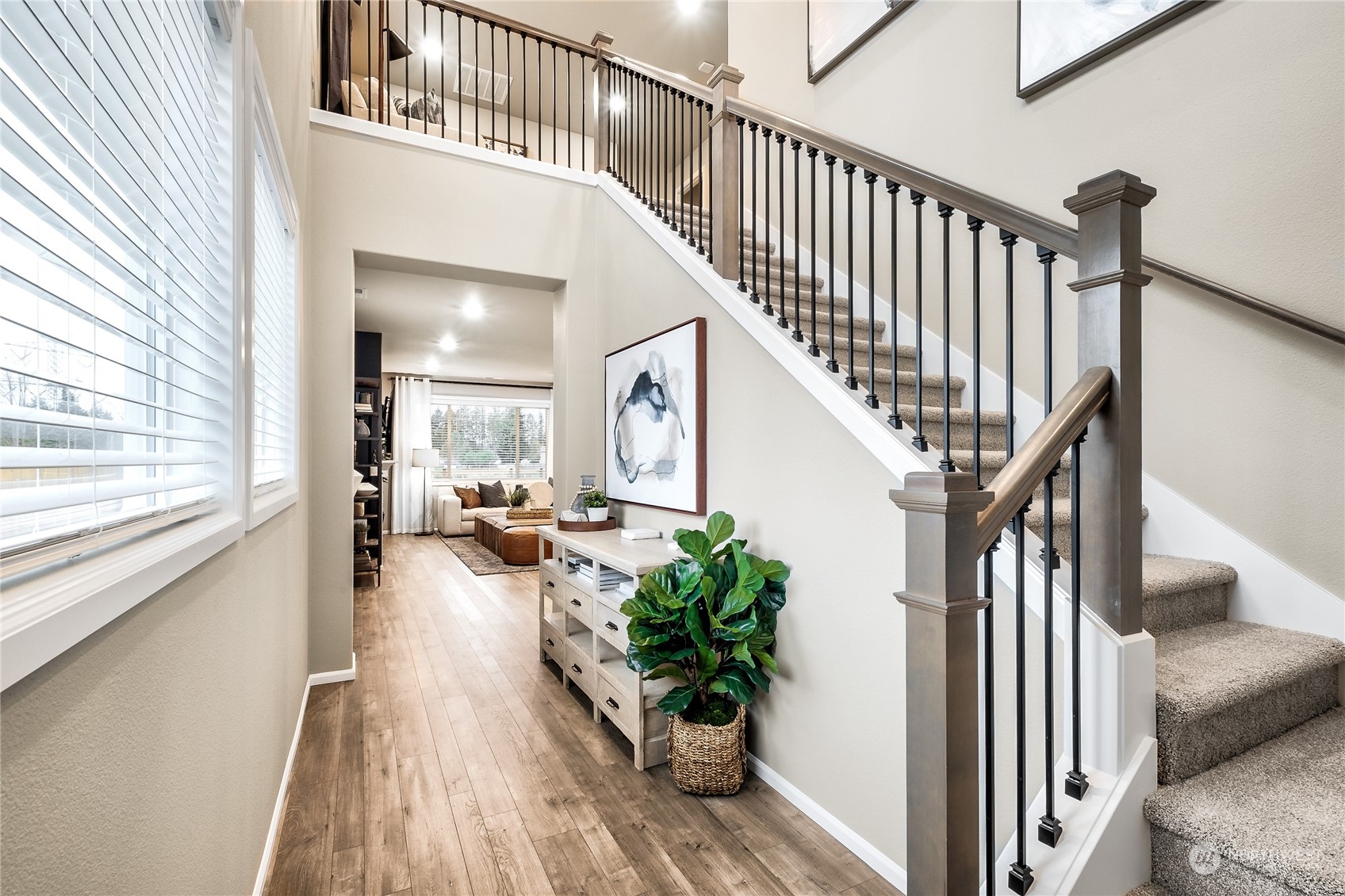 3932 233rd Street Southeast, Unit 83 Bothell, WA 98021 - Photo 2 of 18 a view of entryway and hall with wooden floor