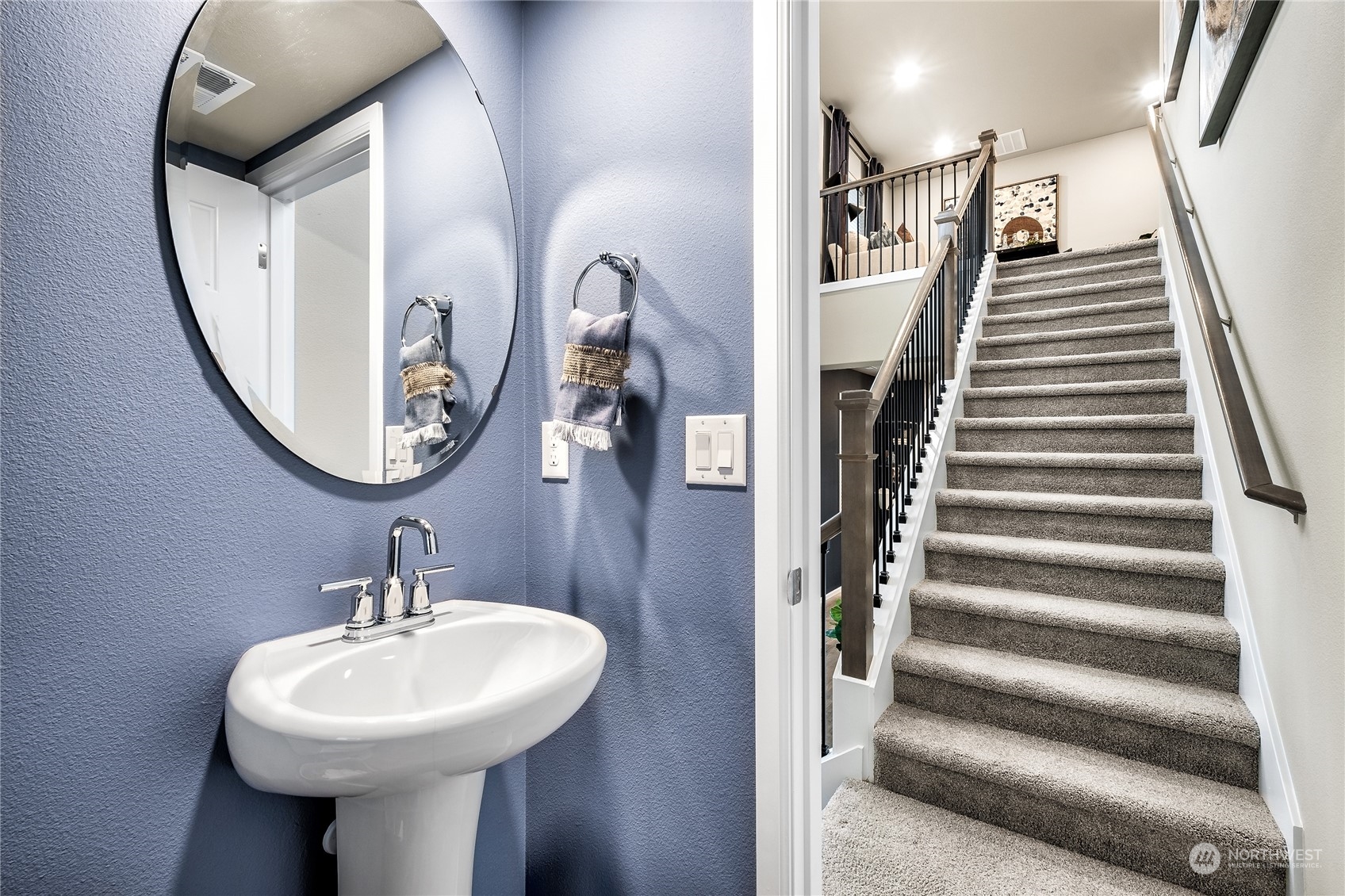 3932 233rd Street Southeast, Unit 83 Bothell, WA 98021 - Photo 3 of 18 a bathroom with a sink and mirror