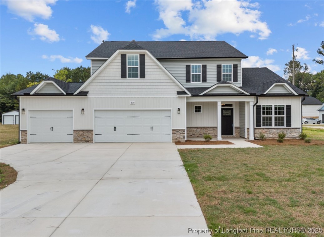 332 Zeppelin Lane Raeford, NC 28376 - Photo 1 of 2 front view of a house with a yard