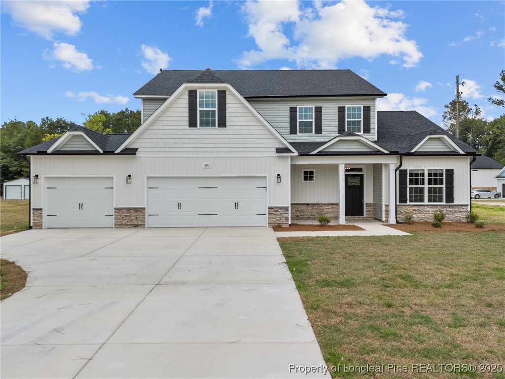 332 Zeppelin Lane Raeford, NC 28376 - Photo 2 of 2 front view of a house with a yard