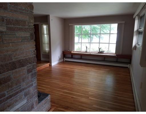 240 Alden Road Fairhaven, MA 02719 - Photo 8 of 19 a view of empty room with wooden floor and fan