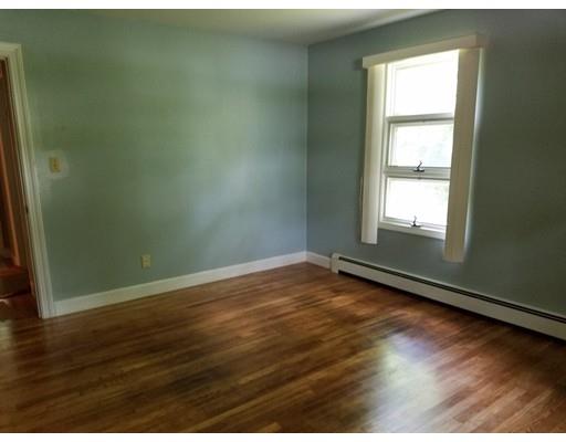 240 Alden Road Fairhaven, MA 02719 - Photo 9 of 19 an empty room with wooden floor and windows