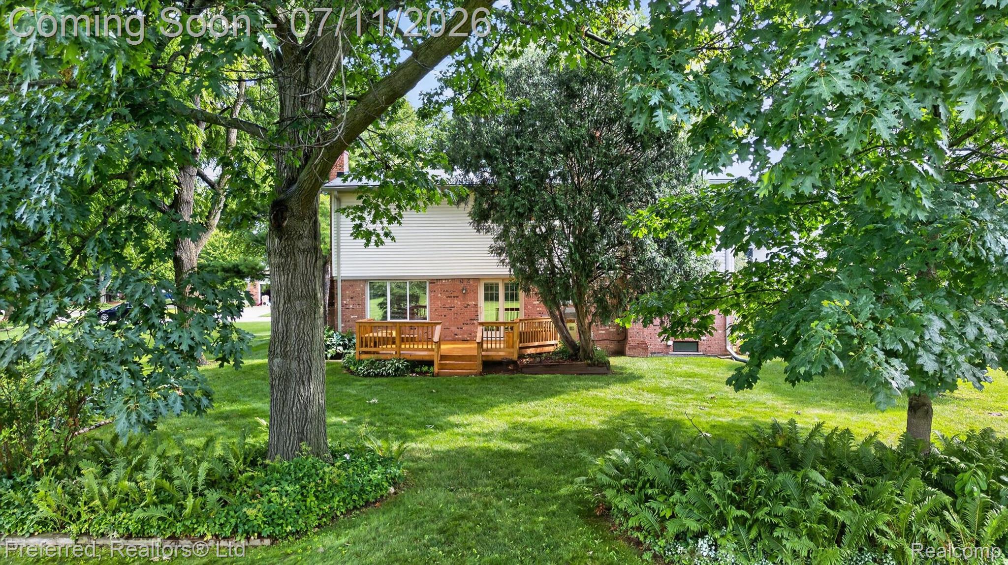 46596 Maidstone Road Canton, MI 48187 - Photo 54 of 61 Spacious rear yard featuring a large wooden deck