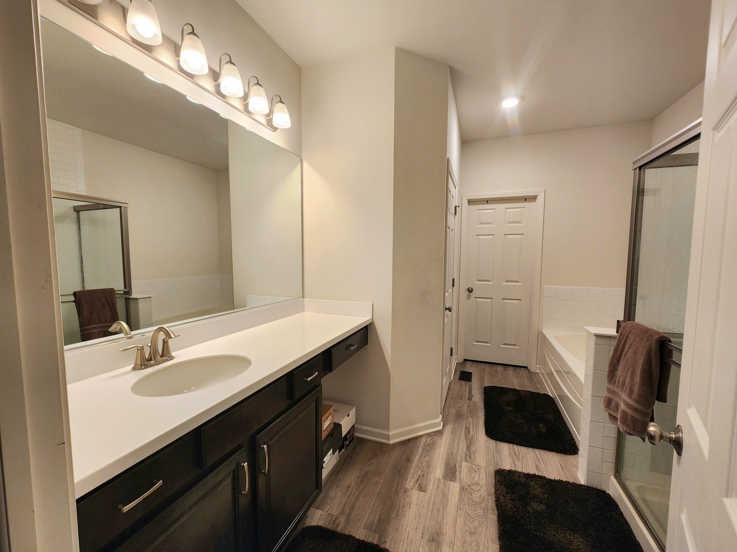2003 Magenta Lane Algonquin, IL 60102 - Photo 11 of 29 a bathroom with a sink a mirror and a shower