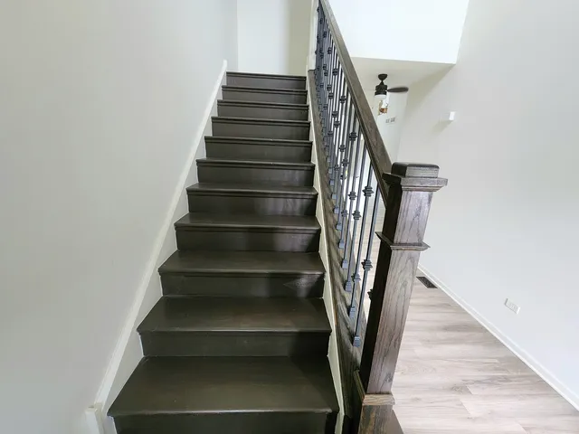 a view of hallway with stairs