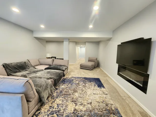 a view of a livingroom with furniture and windows