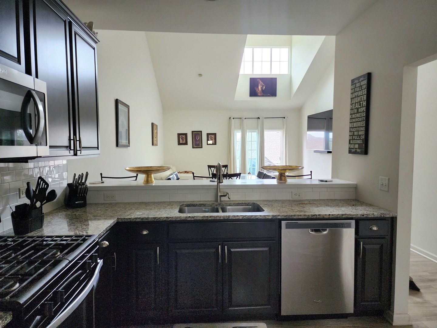 2003 Magenta Lane Algonquin, IL 60102 - Photo 4 of 29 a kitchen with stainless steel appliances granite countertop a sink stove and cabinets