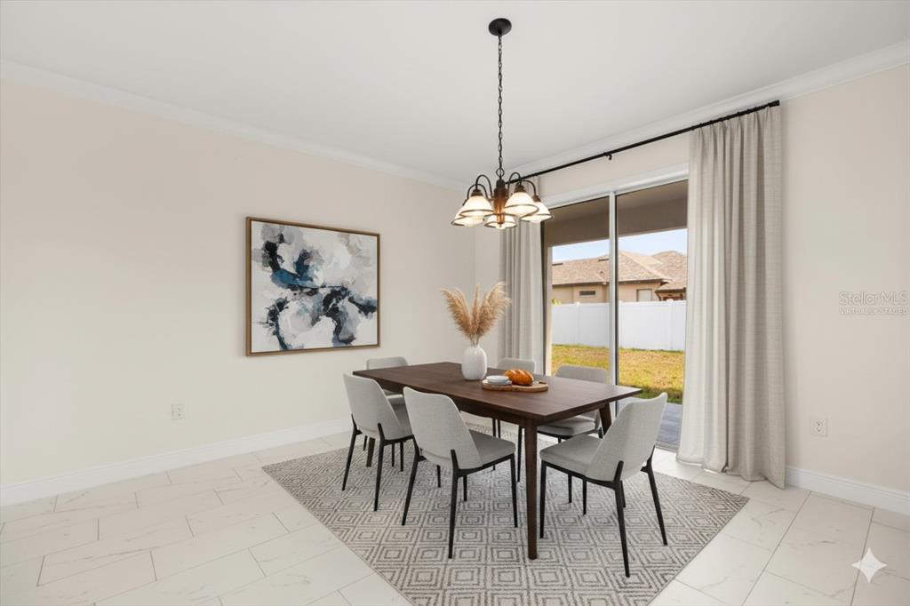840 Oaks Shores Road Leesburg, FL 34748 - Photo 6 of 25 a view of a dining room with furniture window and outside view