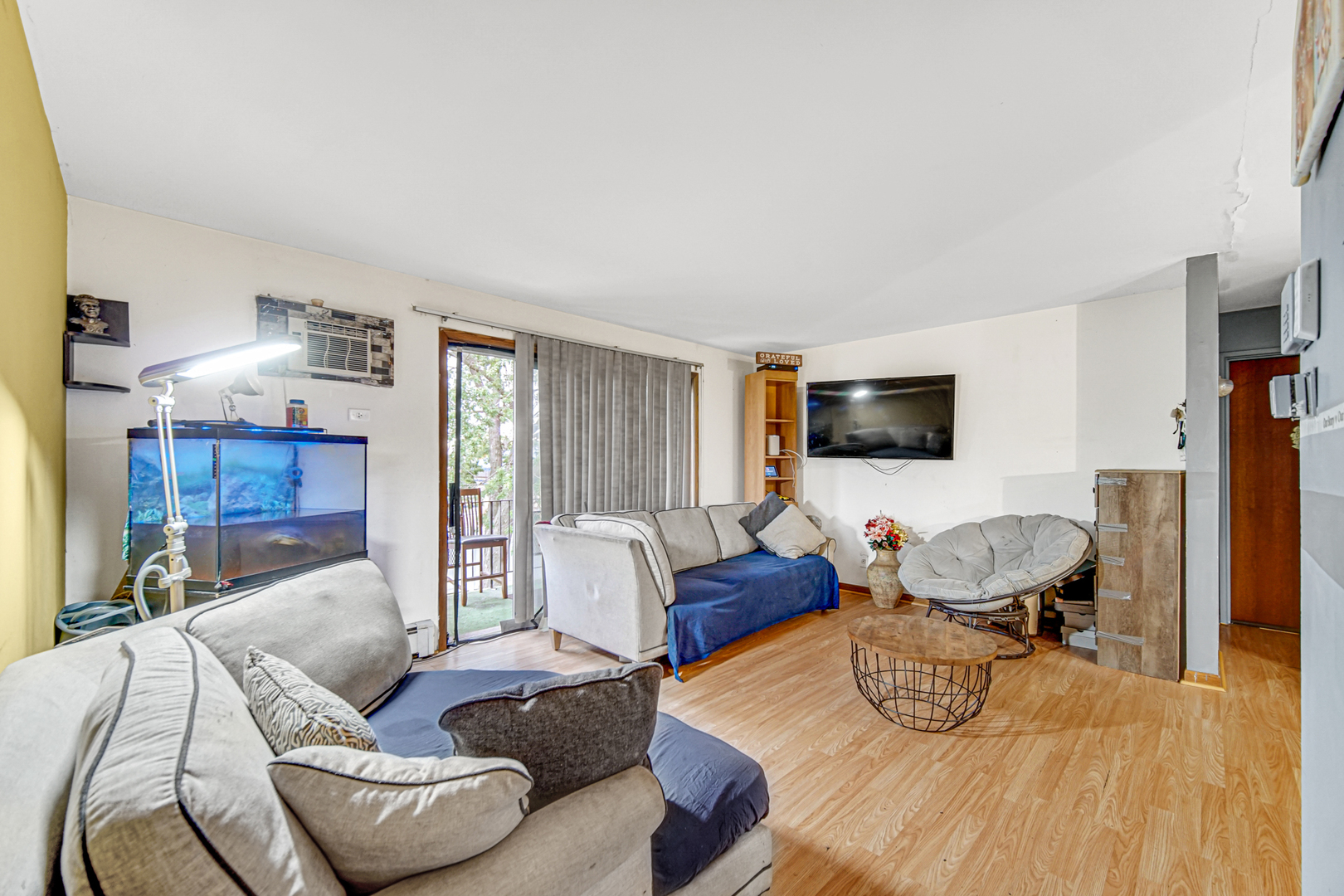 903 Elder Road, Unit 7 Homewood, IL 60430 - Photo 14 of 23 a living room with furniture a flat screen tv and kitchen view