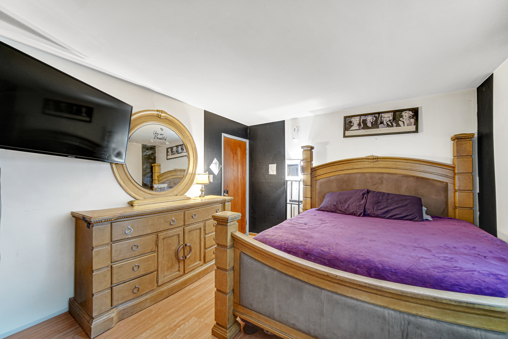 903 Elder Road, Unit 7 Homewood, IL 60430 - Photo 18 of 23 a bedroom with a bed and cabinets