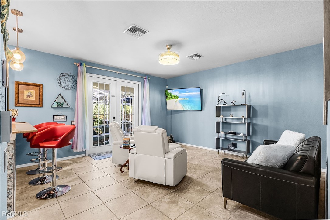 9021 Falcon Pointe Loop Fort Myers, FL 33912 - Photo 15 of 39 a living room with furniture and a window