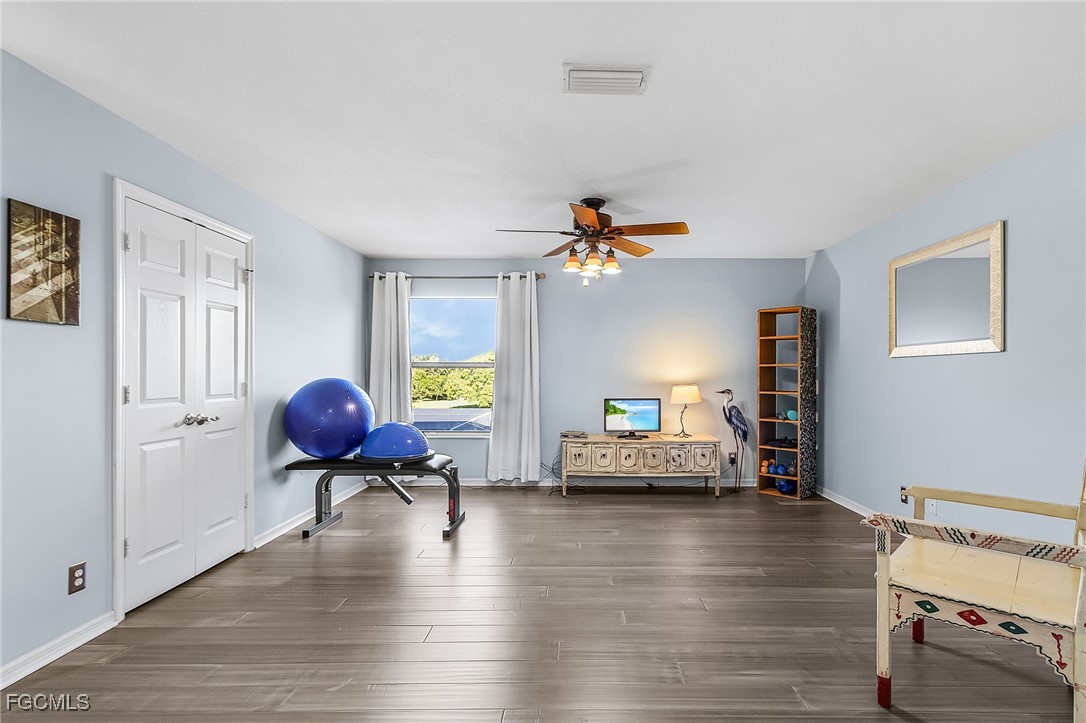 9021 Falcon Pointe Loop Fort Myers, FL 33912 - Photo 19 of 39 a living room with furniture and wooden floor