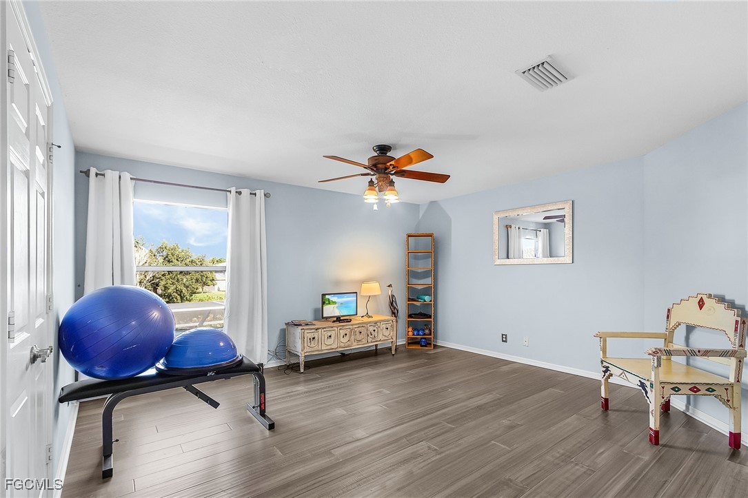 9021 Falcon Pointe Loop Fort Myers, FL 33912 - Photo 20 of 39 a living room with furniture and a large window