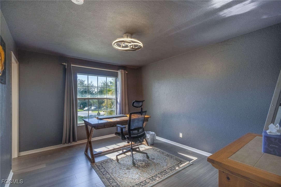 9021 Falcon Pointe Loop Fort Myers, FL 33912 - Photo 21 of 39 a workspace with wooden floor