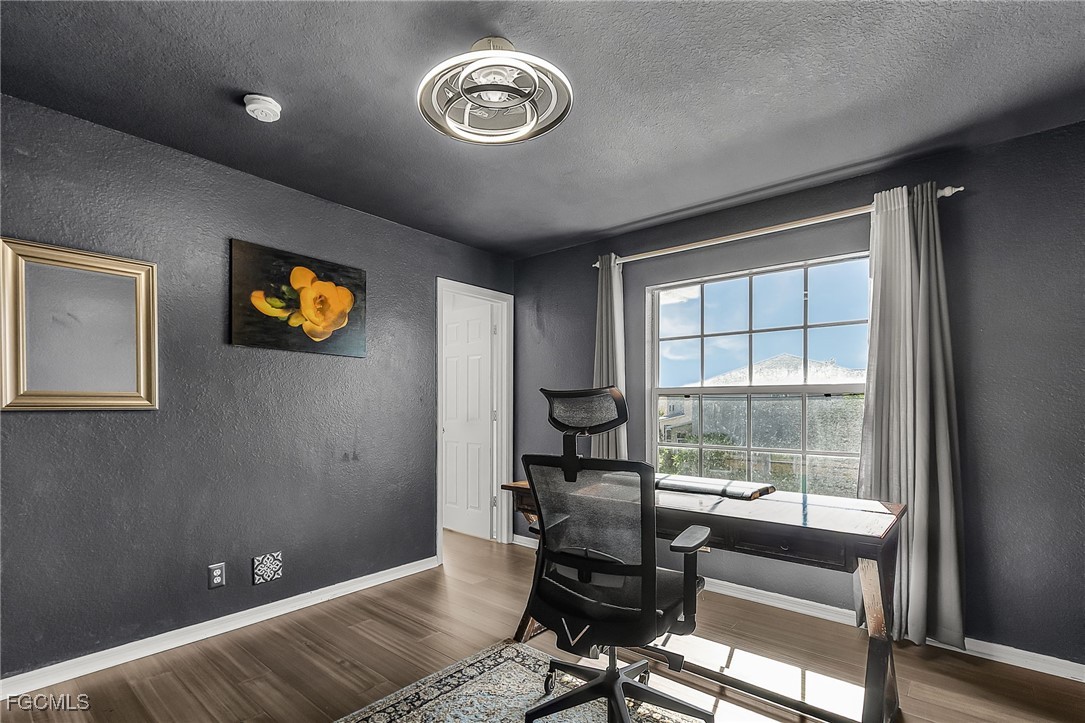 9021 Falcon Pointe Loop Fort Myers, FL 33912 - Photo 22 of 39 a view of a livingroom with furniture and window