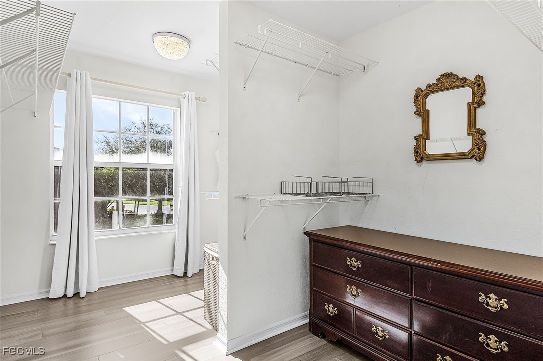 9021 Falcon Pointe Loop Fort Myers, FL 33912 - Photo 32 of 39 a room with storage and utility