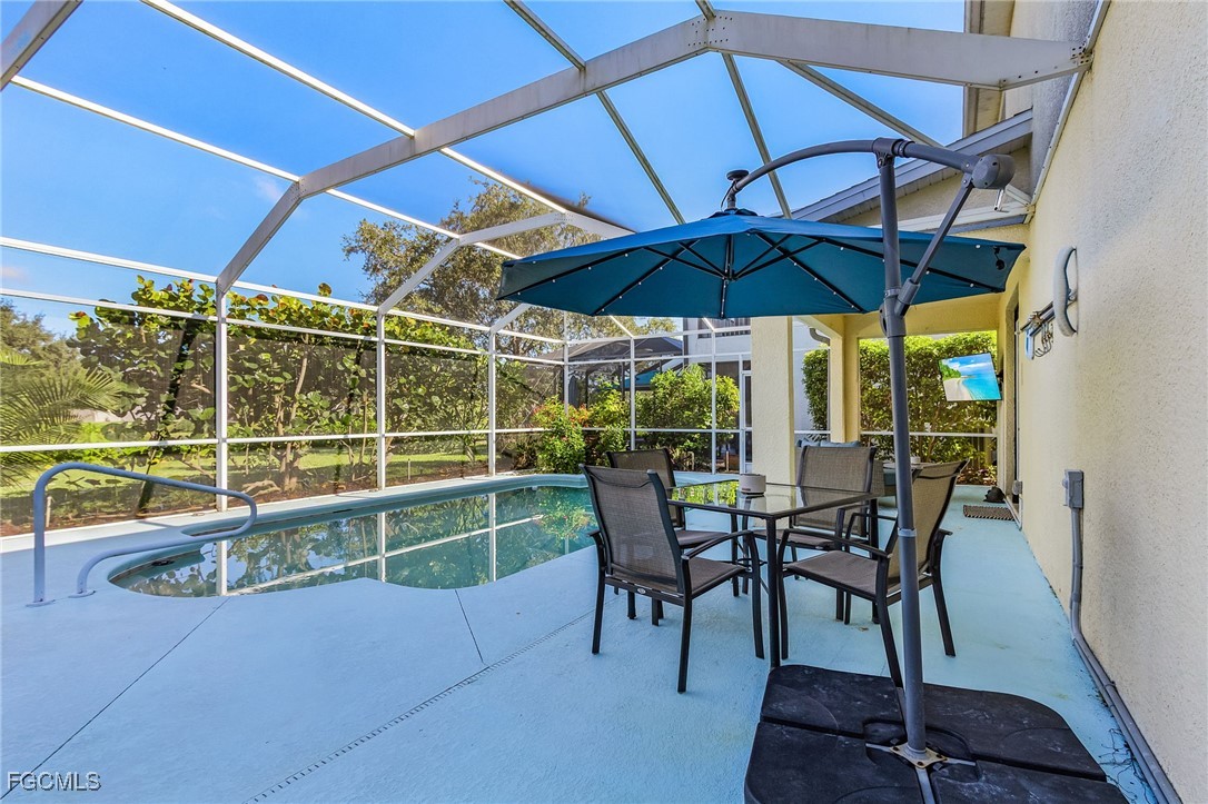 9021 Falcon Pointe Loop Fort Myers, FL 33912 - Photo 36 of 39 a view of chairs and table in the patio