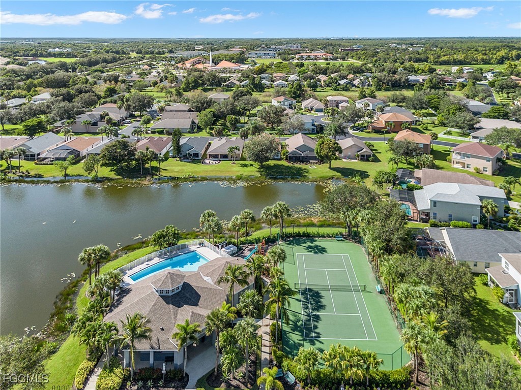 9021 Falcon Pointe Loop Fort Myers, FL 33912 - Photo 39 of 39 an aerial view of a house with a lake view