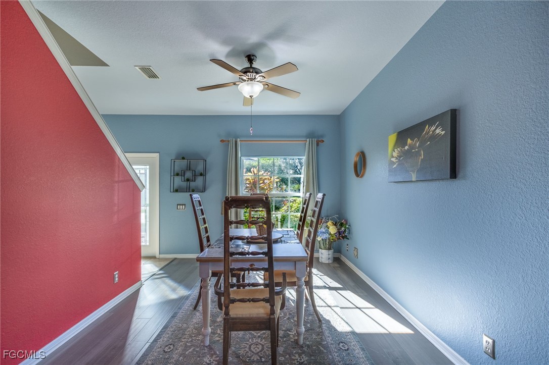 9021 Falcon Pointe Loop Fort Myers, FL 33912 - Photo 8 of 39 a dining room with furniture and window