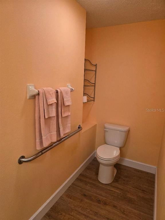 9028 Southwest 91st Circle Ocala, FL 34481 - Photo 14 of 31 a bathroom with a toilet