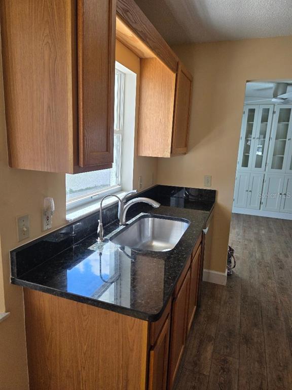 9028 Southwest 91st Circle Ocala, FL 34481 - Photo 26 of 31 a kitchen with a sink and a window