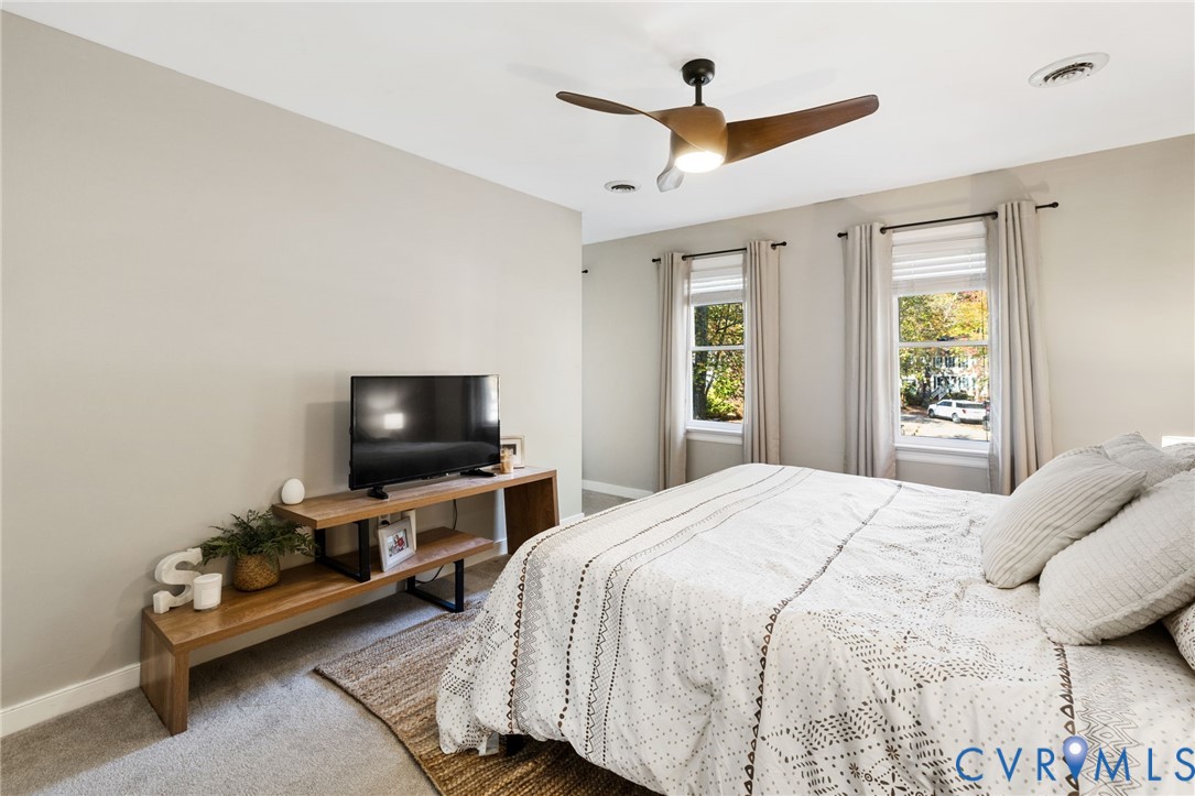 14701 Acorn Ridge Place Midlothian, VA 23112 - Photo 17 of 26 a bedroom with a bed and a flat screen tv