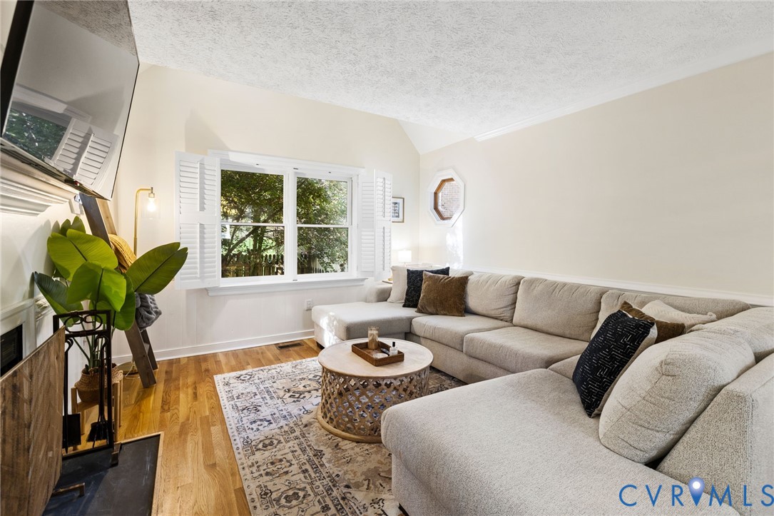 14701 Acorn Ridge Place Midlothian, VA 23112 - Photo 5 of 26 a living room with furniture and a large window