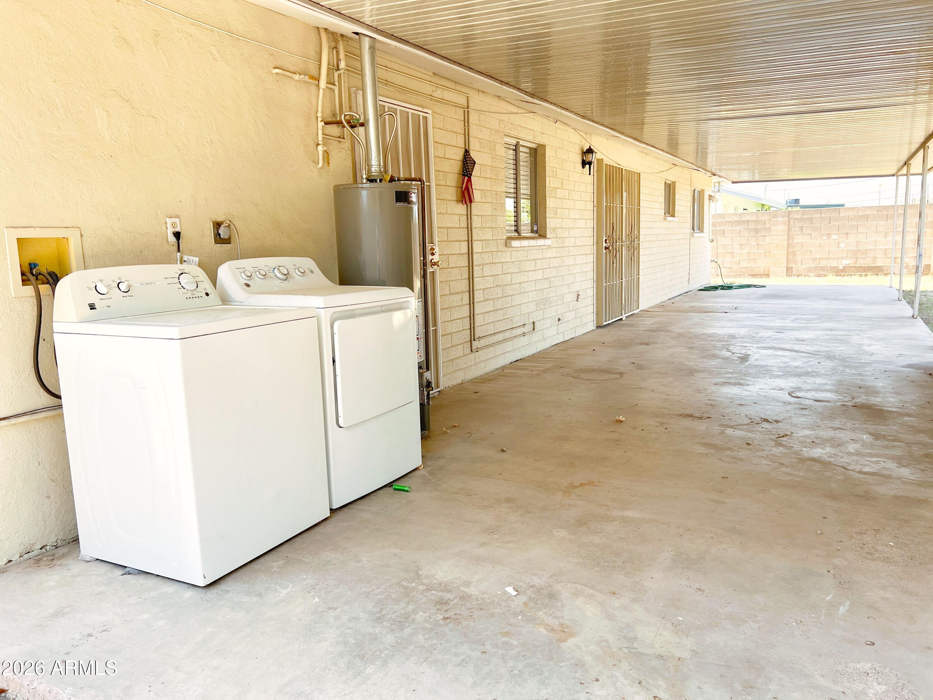 1220 West Romo Jones Street Tempe, AZ 85281 - Photo 24 of 26 a utility room with dryer and washer