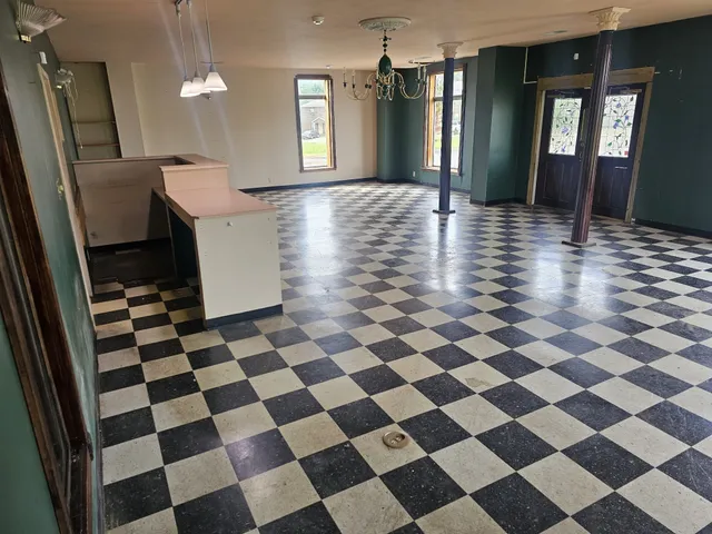 a view of an empty room and window