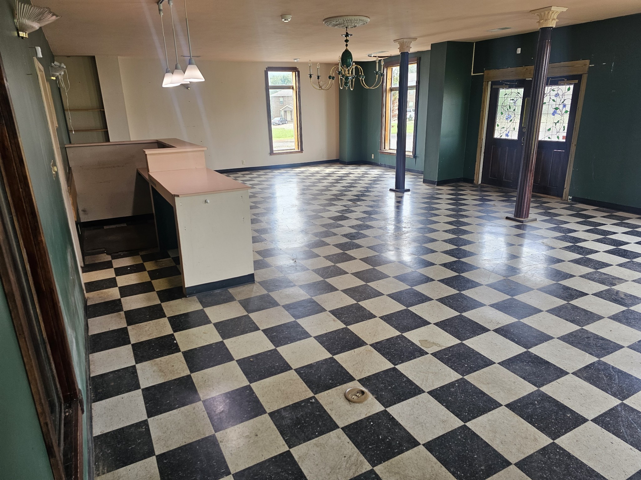 2104 Ruth Street Springfield, TN 37172 - Photo 21 of 61 a view of a entryway with a checkered floor and a dining space
