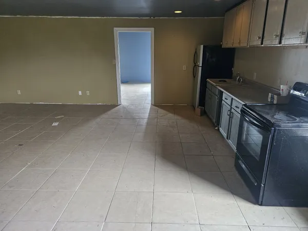 a view of a backyard of the house